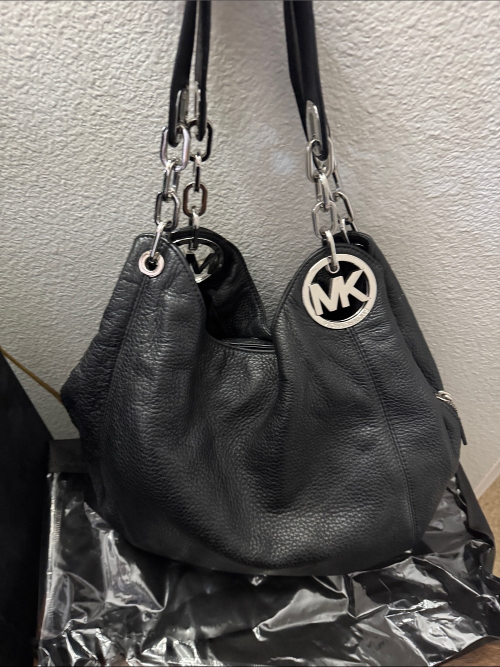 Michael Kors Black Pebble Leather Shoulder Hobo with Silver MK Charm